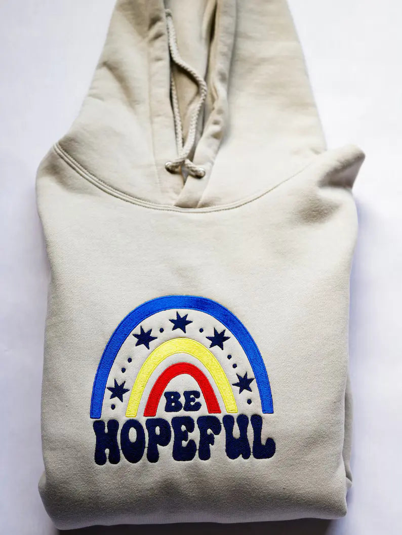 Embroidered Be Hopeful Sweatshirt | Custom Sand Unisex Embroidered Sweatshirt | Faith-Based Clothing | Gift for Friend Faith Sweatshirt